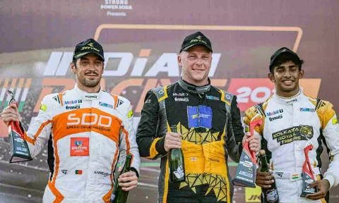 Photo Caption: (L-R) Alvaro Parente, Jon Lancaster, Ruhaan Alva celebrate on the podium