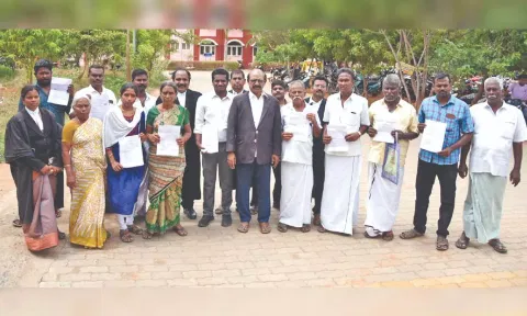 Farmers with compensation orders in Thanjavur on Thursday