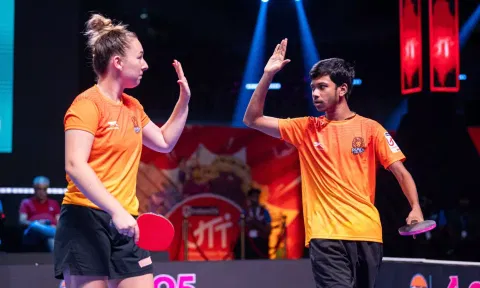 Puneri's Natalia Bajor and Anirban Ghosh celebrate their win in mixed doubles