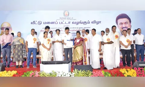 Sports Minister Udhayanidhi Stalin distributing patta