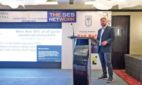 Sam Pullinger delivering his speech at the SESCON 2024 Annual event by the SES Network in Chennai