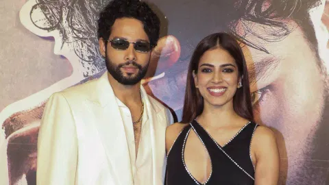 Actors Siddhant Chaturvedi and Malavika Mohanan pose for photos during the trailer launch of film 'Yudhra'