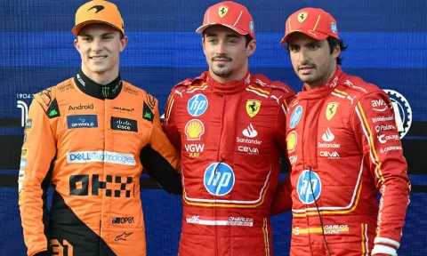 Ferrari's Charles Leclerc (centre) poses with second placed McLaren's Oscar Piastri (left) and third placed Ferrari's Carlos Sainz