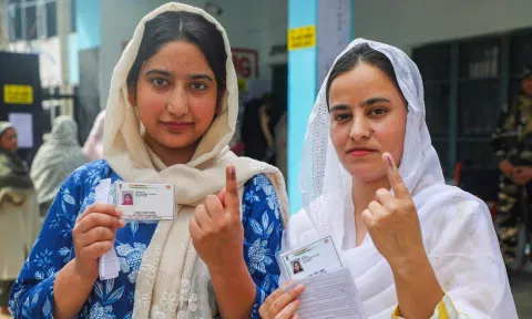 Voters show their fingers marked with indelible ink after casting their votes during the first phase of J&K Assembly elections (PTI)