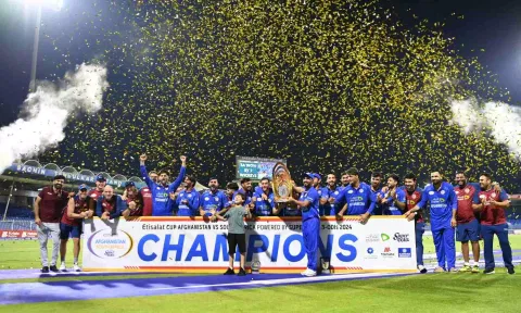 Afghanistan players pose with the trophy after ODI series triumph against South Africa (X/ACBofficials)