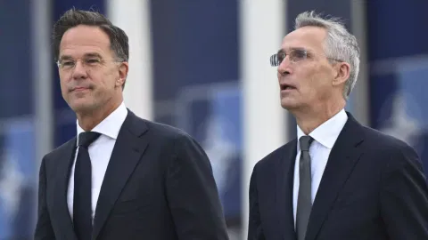  Jens Stoltenberg and Mark Rutte (AP)