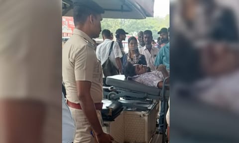 Injured youth ( now deceased ) on a stretcher on Friday at MMC complex