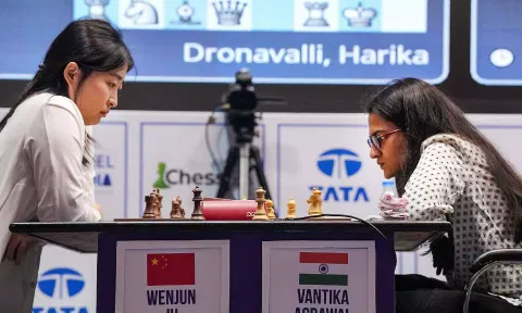  Women's World Chess Champion Wenjun Ju (L) of China and Vantika Agarwal of India during their women's rapid event match