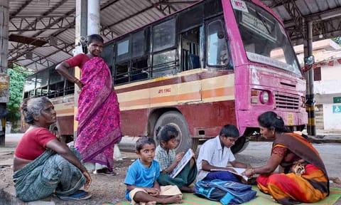 Family seek refuge beneath the dimly-lit and poorly-maintained Ayanavaram bus depot (Photo: Hemanathan M) 