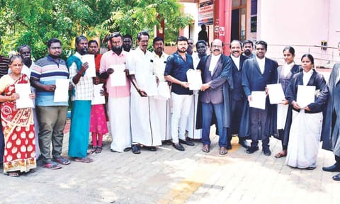Farmers receive court order copy in Thanjavur on Tuesday 