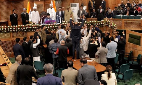 National Conference workers celebrate after a resolution was passed to restore the special status of J&K in the UT Assembly (PTI)