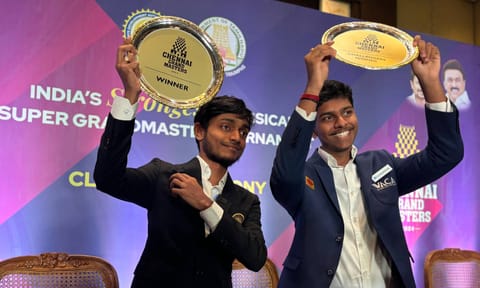 Aravindh Chithambaram and Pranav Venkatesh with their trophies 