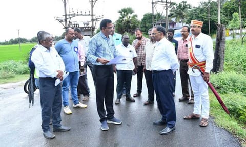 Collector inspects road project 