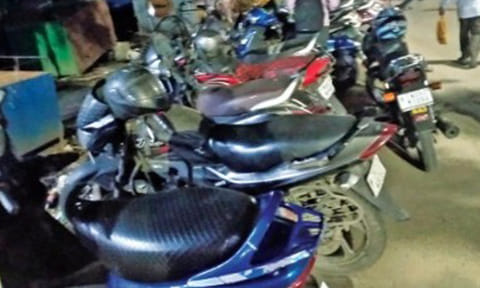 Two-wheelers being parked on the street leading to Egmore railway station from Poonamallee High Road side 