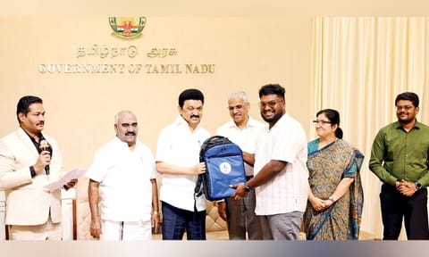 CM Stalin handing over tour kit to a beneficiary at ‘Vergalai Thedi’ event in last August 