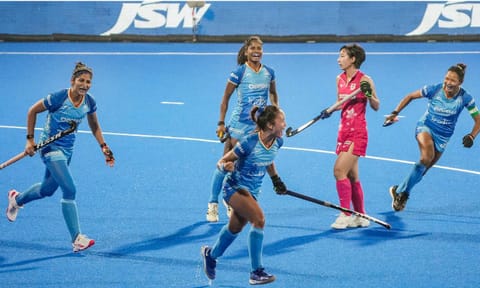 India's Lalremsiami (centre) celebrates after scoring a goal against Japan