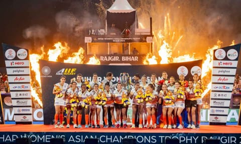  Indian team with the trophy