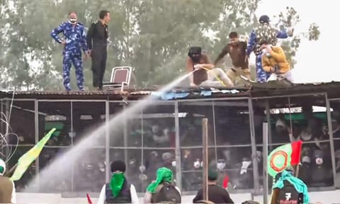 Police use water cannons to disperse farmers agitating at Shambhu border, in Patiala district (PTI) 