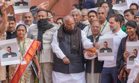 Mallikarjun Kharge with Rahul Gandhi and other opposition MPs stages a protest over the Adani issue and Manipur unrest during the Winter session of Parliament, in New Delhi (PTI) 