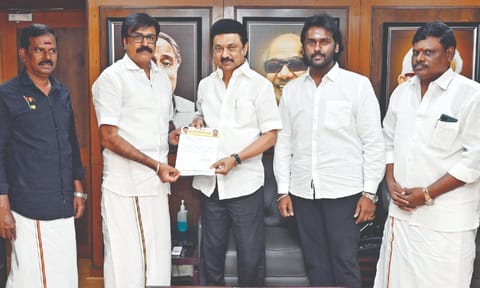 DMDK leaders handing over the invite for party founder Vijayakant’s first death anniversary to DMK president MK Stalin 
