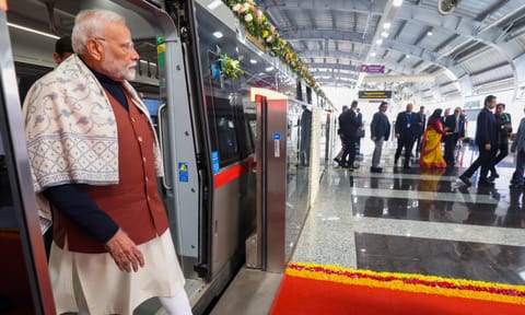 Prime Minister Narendra Modi takes a ride on a Namo Bharat train during the inauguration of the 13 km stretch of the Delhi-Meerut Regional Rapid Transit System (RRTS) corridor between Sahibabad and New Ashok Nagar (PTI)