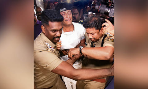 Police personnel arrest businessman Bobby Chemmanur in connection with a sexual harassment complaint filed by Malayalam actress Honey Rose, in Kochi (PTI) 