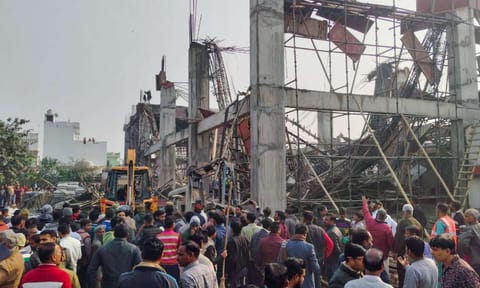 Rescue operation underway after an under-construction building collapsed at the Kannauj railway station, trapping around two dozen workers under the rubble, in Kannauj (PTI) 