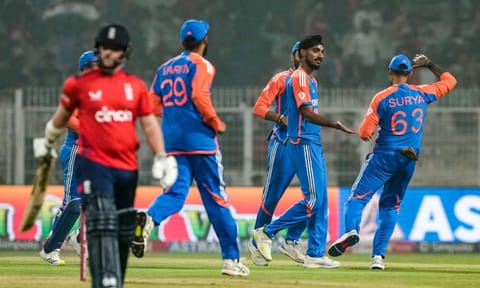 Arshdeep Singh, center, celebrates with teammates after taking the wicket of England's Ben Duckett during the first T20I cricket match of a series between India and England