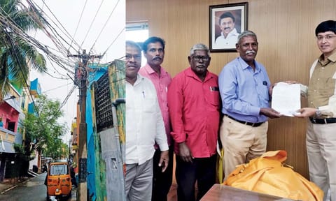 Councillor R Jayaraman submits petition to Tangedco chairman J Radhakrishnan about overhead cables (top)