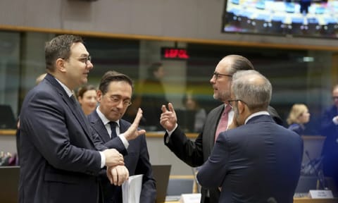 Czech Republic's foreign minister Jan Lipavsky, left, speaks with Spain's foreign minister Jose Manuel Albares Bueno, second left, and Austria's foreign minister Alexander Schallenberg, second right, during a meeting of EU foreign ministers at the European council meeting in Brussels (AP) 