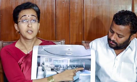  Leader of Opposition in the Delhi Assembly Atishi with AAP MLA Kuldeep Kumar address the media, in New Delhi, Tuesday (PTI)