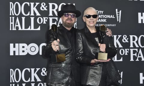 Inductees Dave Stewart, left, and Annie Lennox of Eurythmics pose in the press room during the Rock & Roll Hall of Induction Ceremony (AP)
