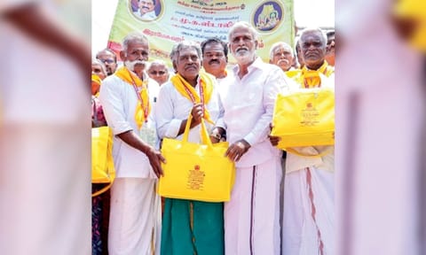 HR&CE Minister PK Sekarbabu handing over travel kit to devotees taking a Rameswaram to Kashi trip, on Thursday