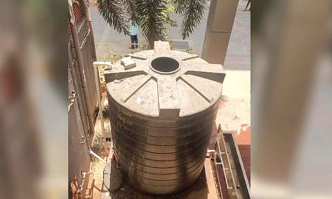 Drinking water tank kept open and surrounded by filth
