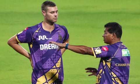 KR coach Chandrakant Pandit with bowler Spencer Johnson during a training session