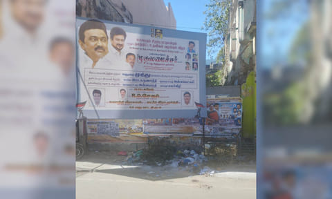 Hoardings of political parties are kept haphazardly on the roadside posing danger in Old Washermenpet 