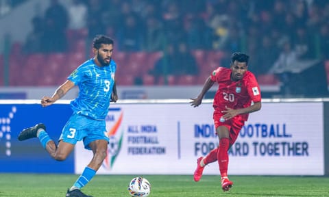Subhasish Bose takes a shot during the match 