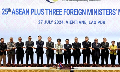 Foreign ministers pose for a group photo at the 25th Asean Plus Three Foreign Ministers’ Meeting 
