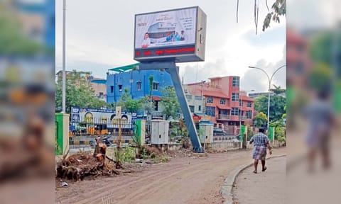  Stumps of the trees left behind at the Murasoli Maran park beside the digital board in Perambu