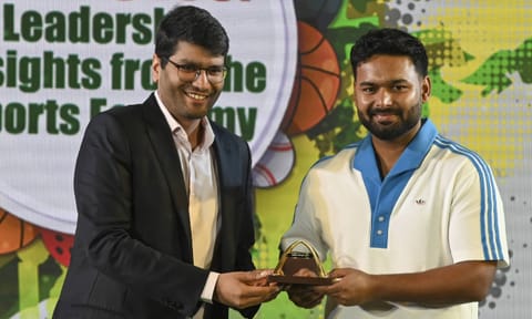 Confederation of Indian Industry (CII) Eastern Region Chairman and RP-Sanjiv Goenka Group Vice Chairman Shashwat Goenka with Indian cricketer Rishabh Pant during the 'India@100: Leadership Insight from the Sports Economy' event (PTI) 