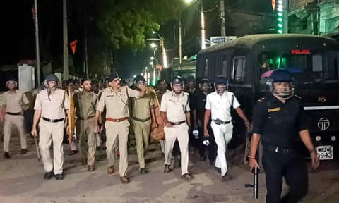 Police and security personnel keep a vigil at an area amid protests over the Waqf (Amendment) Act, in Murshidabad district, West Bengal (PTI)