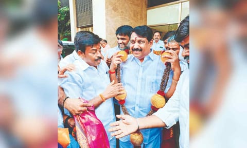 BJP state president Nainar Nagenthran getting a reception at the Thoothukudi airport on Monday