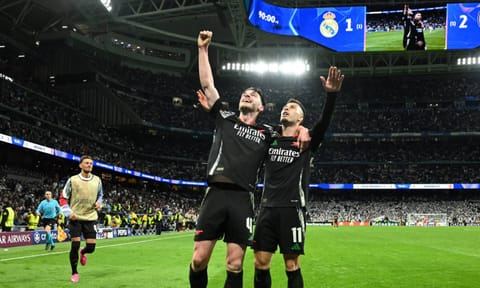Gabriel Martinelli celebrates with Declan Rice after scoring