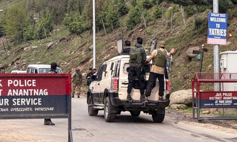Security personnel move towards the site after terrorists attacked a group of tourists at Pahalgam, in Anantnag district, Jammu & Kashmir (PTI)