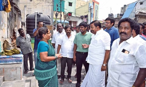 Minister KN Nehru interacts with a resident of Ward 10 in Woraiyur on Saturday 