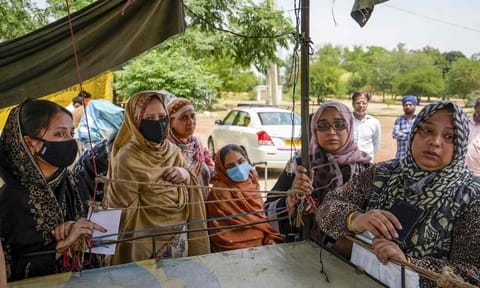 Stranded people, some holding Indian passports while their children have Pakistani passports, wait at the Integrated Check Post near the Attari-Wagah border, in Amritsar district, Friday, May 2, 2025 (PTI) 