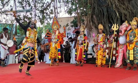 Artistes performing Deiveega Natanam at a temple festival 
