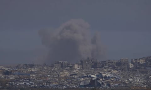 Smoke rises to the sky in the Gaza strip as seen from southern Israel (AP)