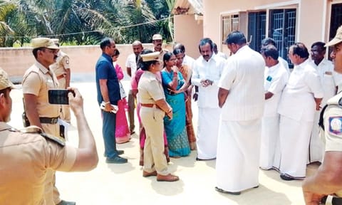 Minister for Housing and Urban Development S Muthusamy consoles the grieving family in Erode, on Wednesday