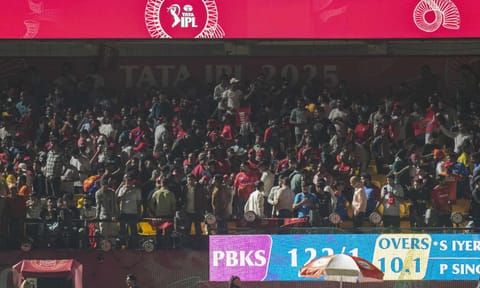 Spectators leave after the Indian Premier League (IPL) 2025 T20 cricket match between Punjab Kings and Delhi Capitals was suspended, at the HPCA Stadium, in Dharamsala, Thursday, May 8, 2025 (PTI) 